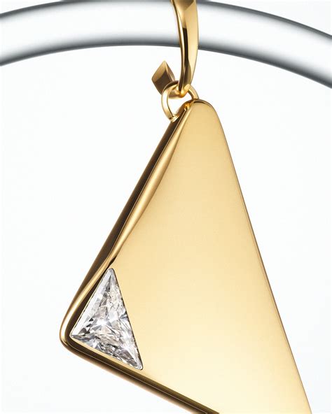 prada triangle jewelry.